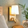 Aplique de pared Aiden de Lindby, 30 cm, latón antiguo, brazo de lectura LED
