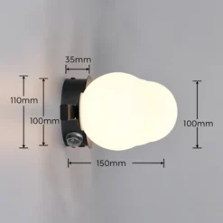 Aplique de pared Alfio, 50 cm, metal negro/cristal, IP44, 3 luces.