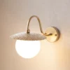 Aplique de pared Anemon, color dorado, altura 29 cm, metal/vidrio, E14