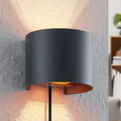 Aplique de pared Arcchio Zuzana, redondo, negro, enchufe, 13 cm