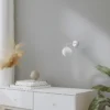 Aplique de pared Astral, blanco, proyección 22 cm, acero/vidrio