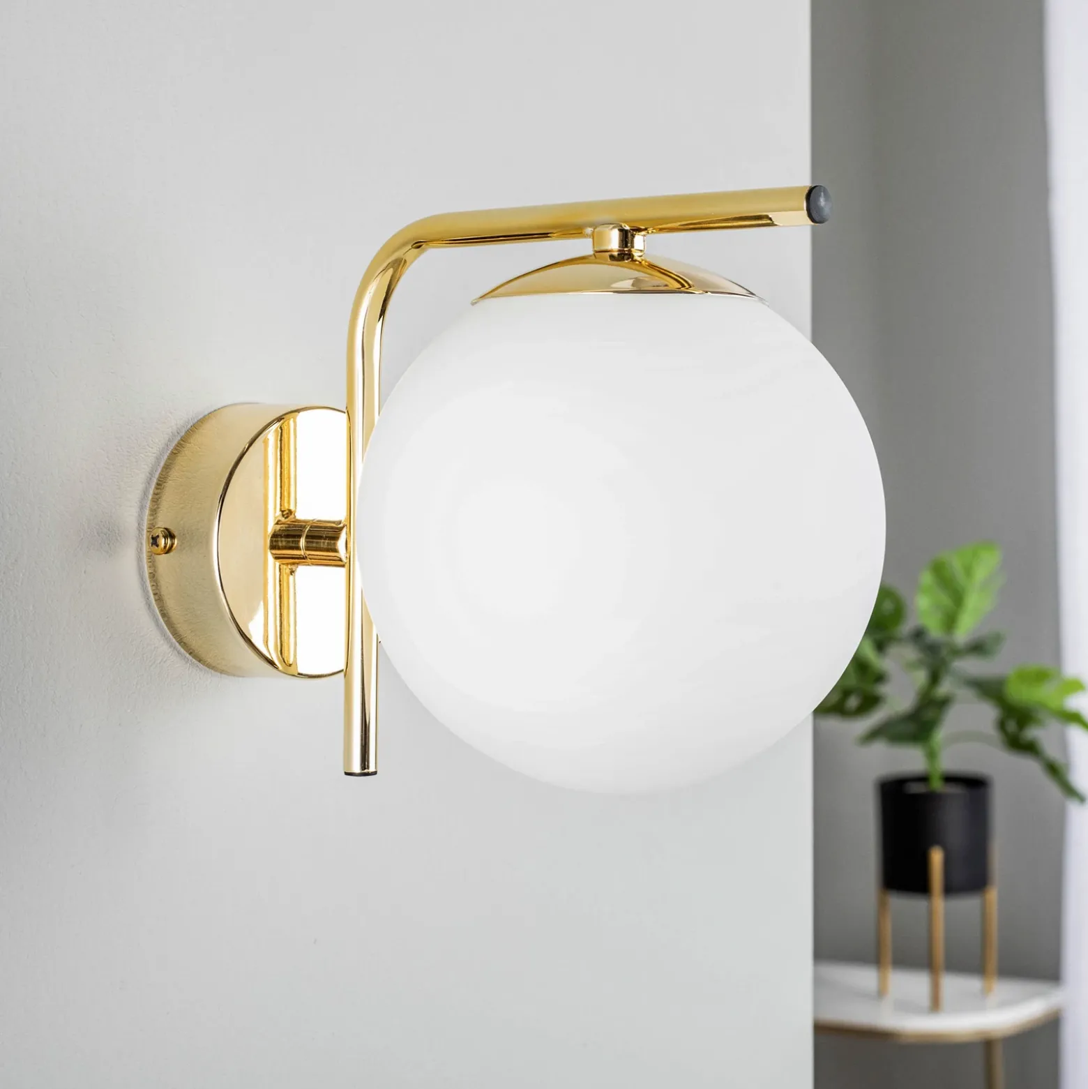 Aplique de pared Aurora, dorado, cristal, 17 cm de alto, esférico, E14