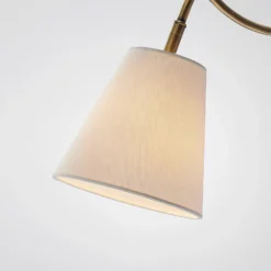 Aplique de pared Ethan de Lindby, blanco/latón antiguo, enchufe, 28 cm, E14