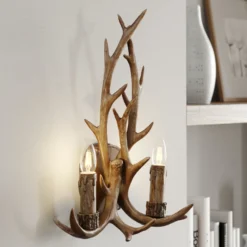Aplique de pared Fibi de Lindby, marrón, asta, 2 luces, E14