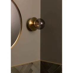 Aplique de pared Globen Lighting ART DECO, latón/gris Ø 16 cm IP44