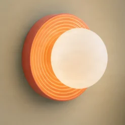 Aplique de pared Harriet de Lindby, naranja/blanco, cerámica, Ø 22 cm, G9