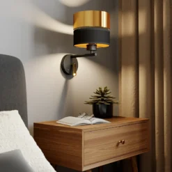 Aplique de pared Hilton negro/dorado con brazo de lectura LED