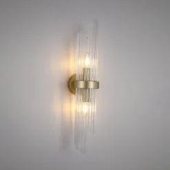 Aplique de pared Lara, altura 56 cm, dorada/transparente, vidrio/metal
