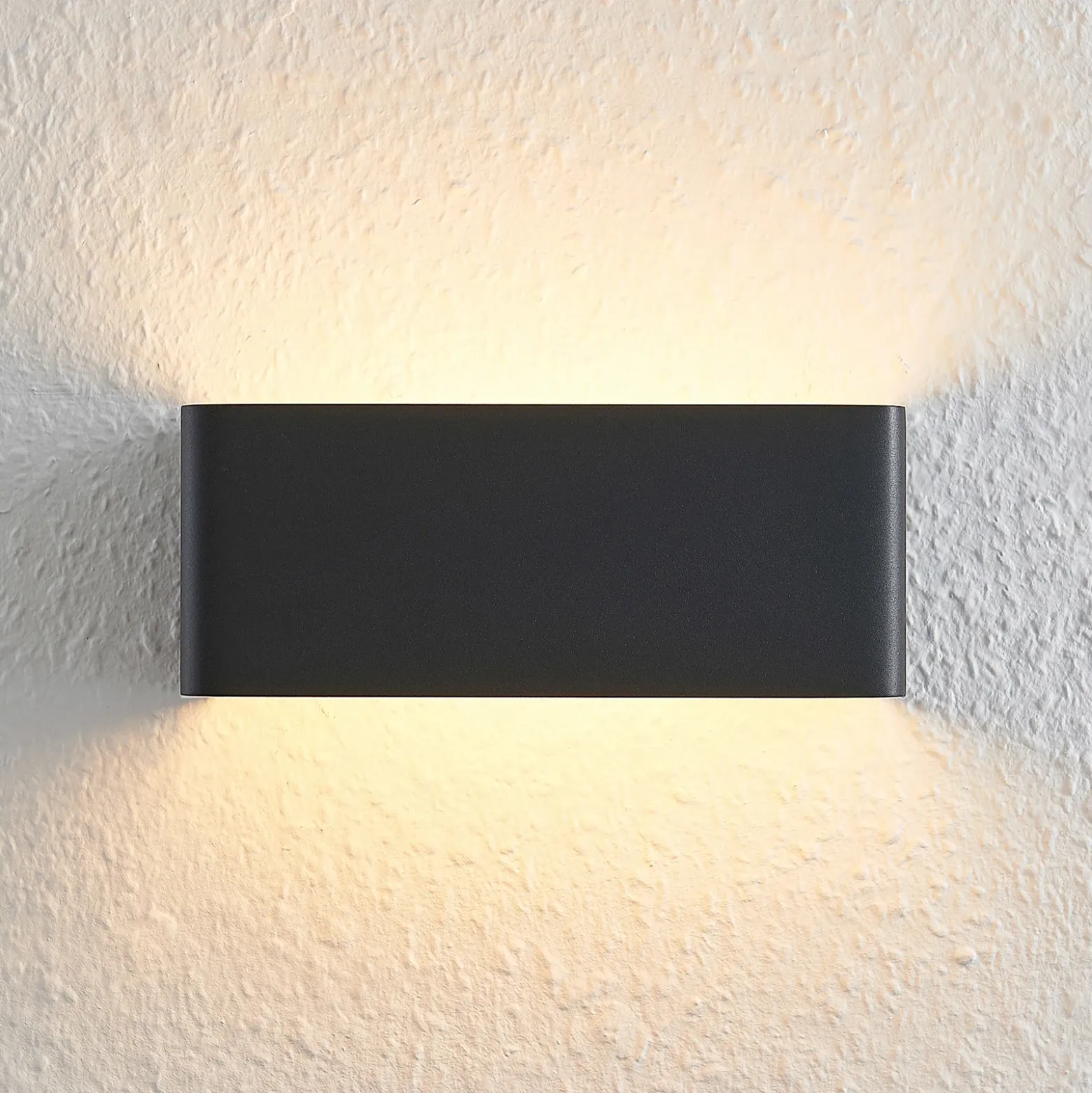 Aplique de pared LED Arcchio Karam, 20 cm, negro, metal, arriba/abajo