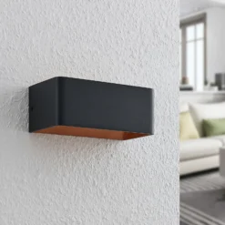 Aplique de pared LED Arcchio Karam, 20 cm, negro, metal, arriba/abajo
