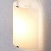 Aplique de pared LED Lindby Helmi, altura 21 cm, cristal, semicircular