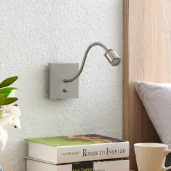 Aplique de pared LED Lindby Legera, 11 cm, color níquel, brazo flexible
