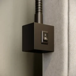Aplique de pared LED Tuso, negro, montaje en cama, metal