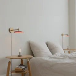 Aplique de pared LED UMAGE Asteria Short, rosa/latón, enchufe