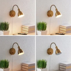 Aplique de pared Lindby Amrei, latón envejecido, 42 cm, enchufable, atenuable