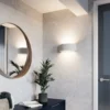 Aplique de pared Lindby Cassian, escayola, 32 cm, blanco, semicircular