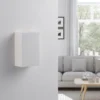 Aplique de pared Lindby Colja, angular, altura 16 cm, escayola, blanco