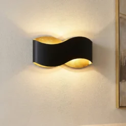 Aplique de pared Lindby Dailin, negro/dorado, 30 cm, metal