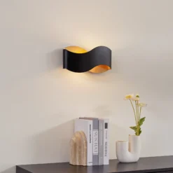 Aplique de pared Lindby Dailin, negro/dorado, 30 cm, metal