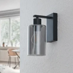 Aplique de pared Lindby Emavi, negro/gris humo, cristal, E27