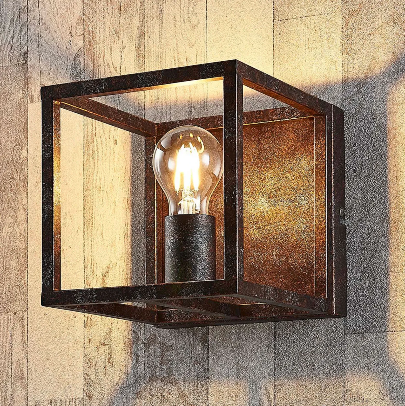 Aplique de pared Lindby Emin, ancho 18 cm, color óxido, metal