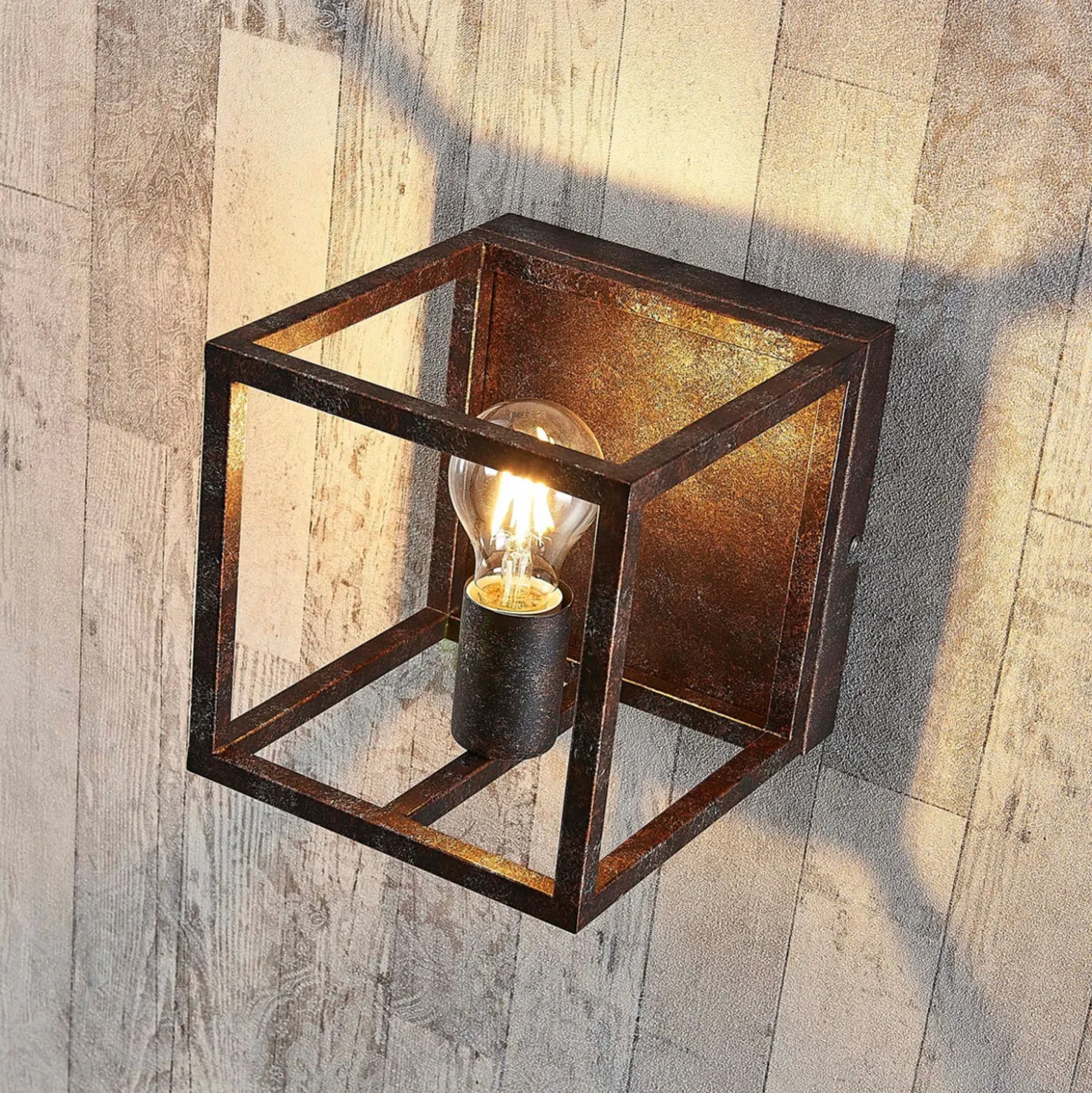 Aplique de pared Lindby Emin, ancho 18 cm, color óxido, metal