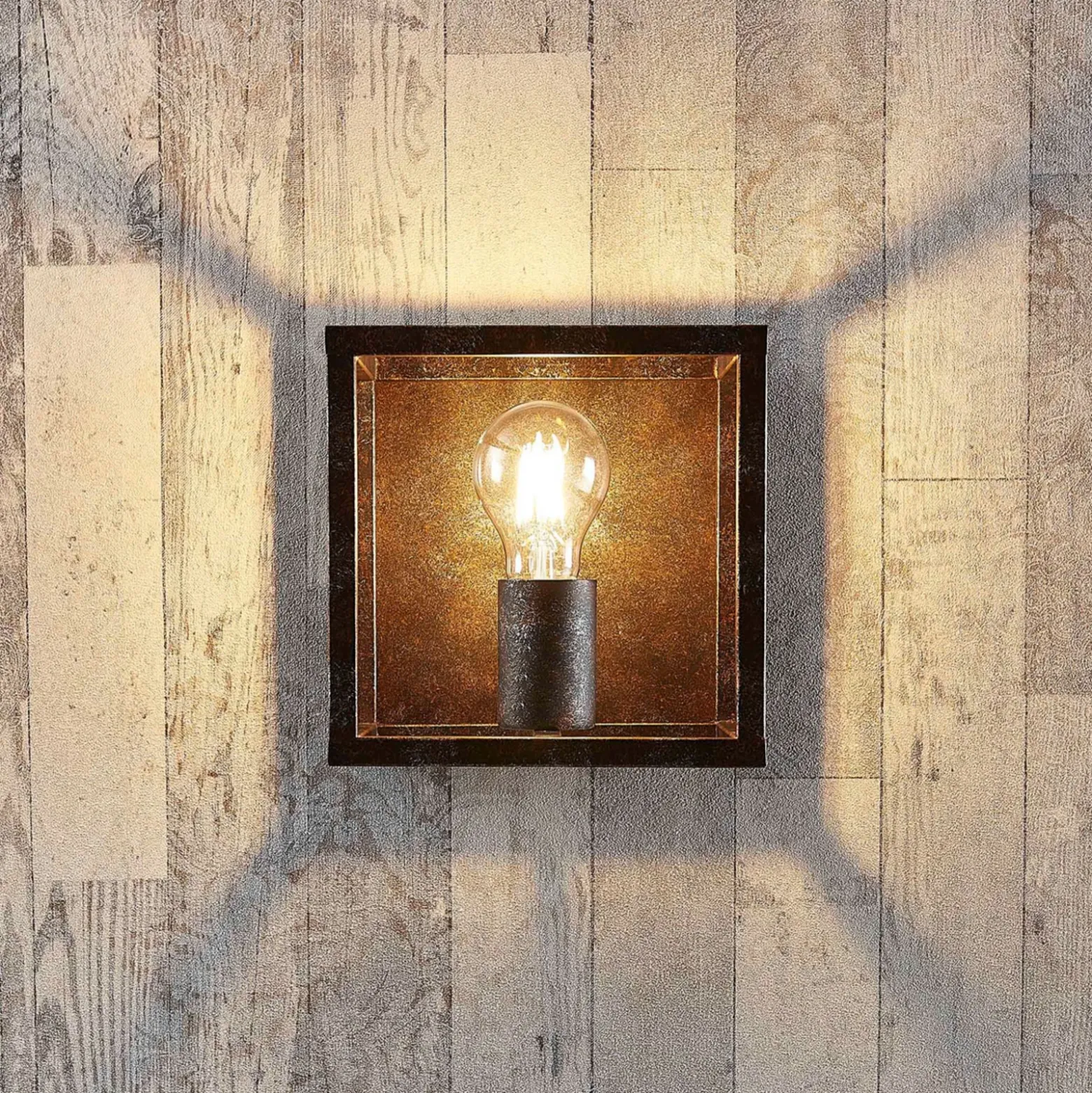 Aplique de pared Lindby Emin, ancho 18 cm, color óxido, metal