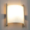 Aplique de pared Lindby Filippa, 25 cm, níquel, cristal, E27