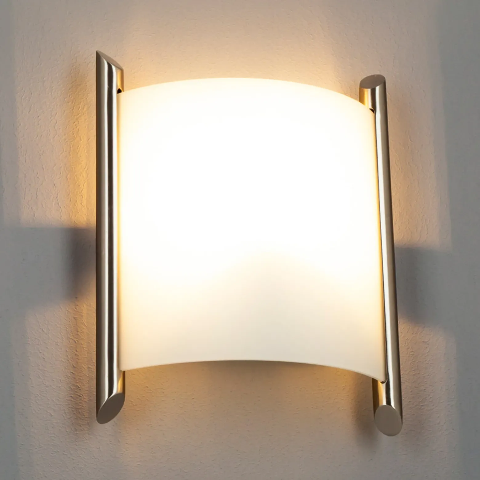 Aplique de pared Lindby Filippa, 25 cm, níquel, cristal, E27
