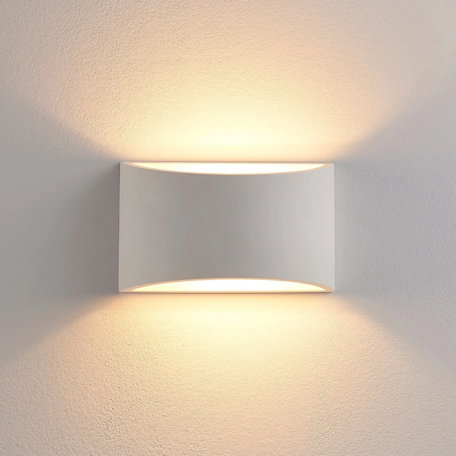 Aplique de pared Lindby Heiko, arriba/abajo, escayola, blanco, altura 12 cm