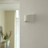 Aplique de pared Lindby Heiko, arriba/abajo, escayola, blanco, altura 12 cm