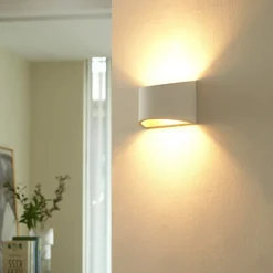 Aplique de pared Lindby Heiko, arriba/abajo, escayola, blanco, altura 12 cm