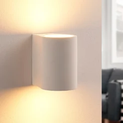 Aplique de pared Lindby Jannes, redondo, blanco, escayola, G9, pintable