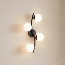 Aplique de pared Lindby Josiana, ópalo/negro, 48 cm, esférico, cristal