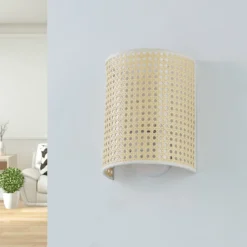 Aplique de pared Lindby Lautaro, bambú, 25 cm de altura, E27