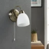 Aplique de pared Lindby Mael, altura 20 cm, latón envejecido, interruptor