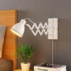 Aplique de pared Lindby Merle, altura 22 cm, blanco, extensible