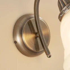 Aplique de pared Lindby Mialina, 20 cm, latón antiguo, metal, cristal