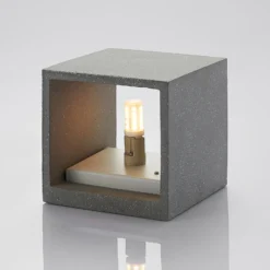 Aplique de pared Lindby Nellie, gris, hormigón, 11,5 cm de ancho