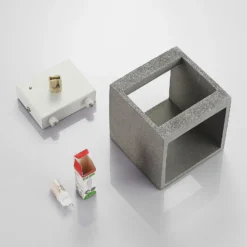Aplique de pared Lindby Nellie, gris, hormigón, 11,5 cm de ancho
