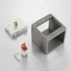 Aplique de pared Lindby Nellie, gris, hormigón, 11,5 cm de ancho