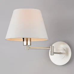 Aplique de pared Lindby Pola, 30 cm, níquel, extensible, textil