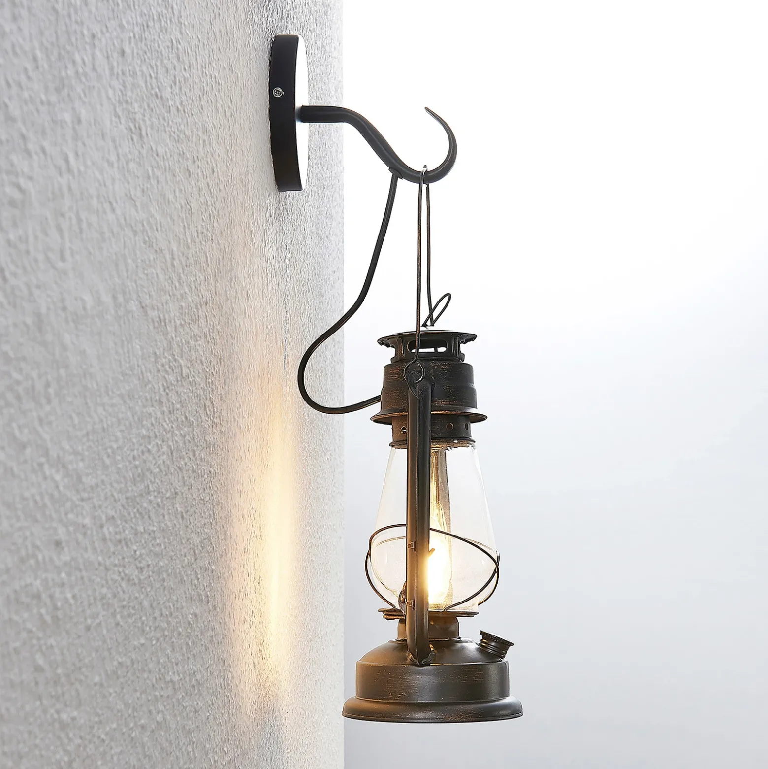Aplique de pared Lindby Raisa, color óxido, metal, farol, E14