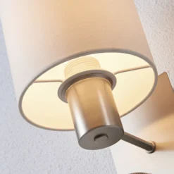 Aplique de pared Lindby Shajan, 29 cm, textil, E27, brazo de lectura LED