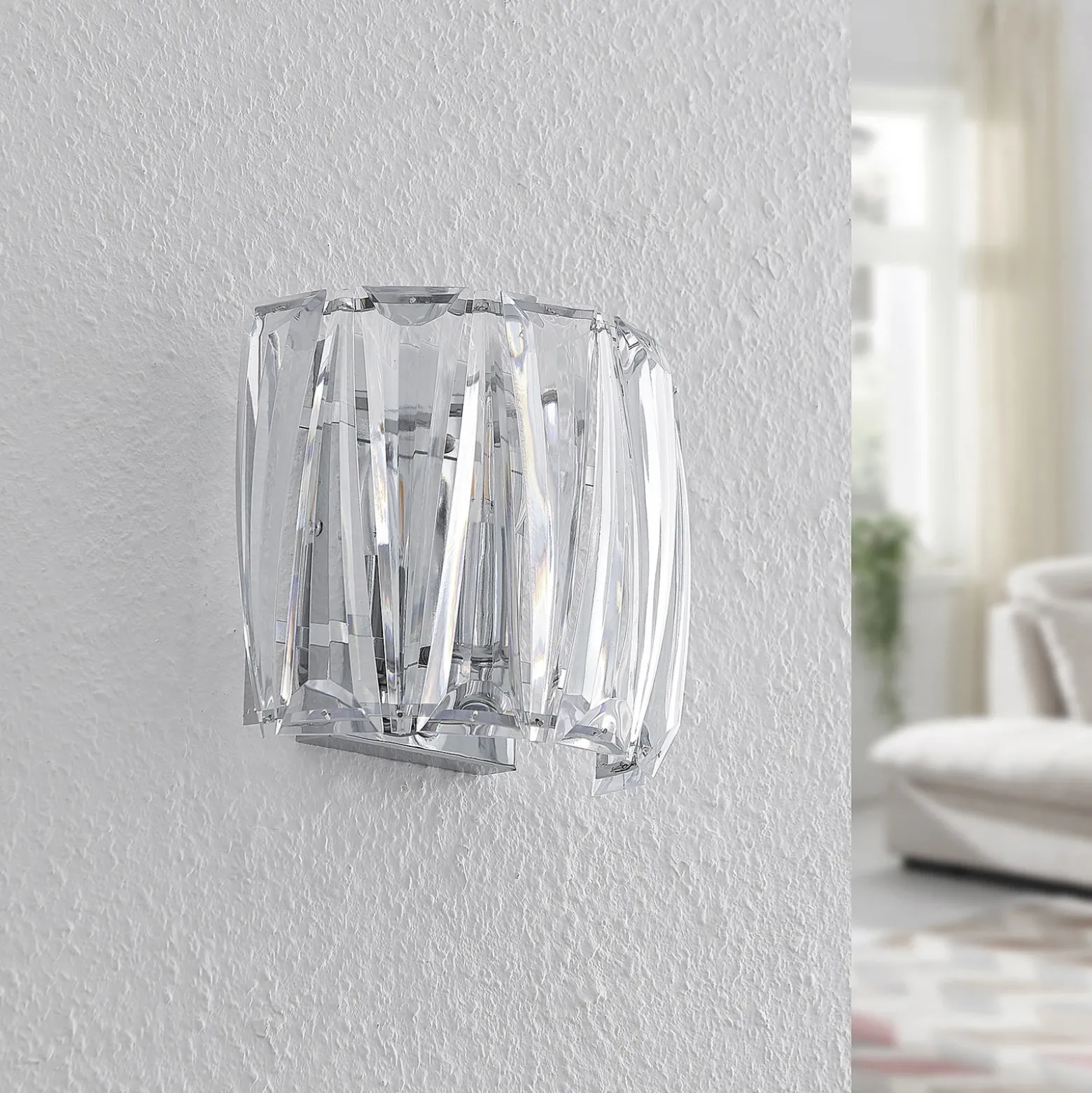 Aplique de pared Lindby Sofia, transparente, acrílico, 23cm