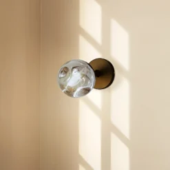 Aplique de pared Lindby Valentina, gris/negro, cristal, Ø 10 cm