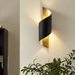 Aplique de pared Lindby Vanni, negro/oro, metal, altura 57cm