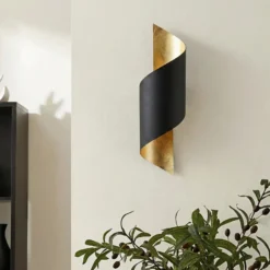 Aplique de pared Lindby Vanni, negro/oro, metal, altura 57cm