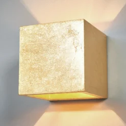 Aplique de pared Lindby Yade, 11 cm, dorado, escayola, G9
