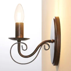 Aplique de pared Lucande Caleb, 18 cm, color óxido, metal, E14